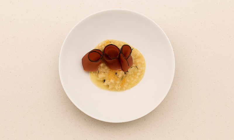 Risotto with apples, speck and Schüttelbrot from South Tyrol