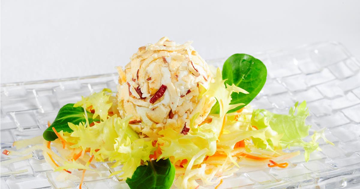 Ricotta pralines in a crust of apple on root vegetables South Tyrol