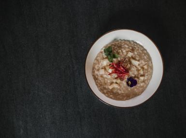 Risotto with chestnut, speck and South Tyrolean apple